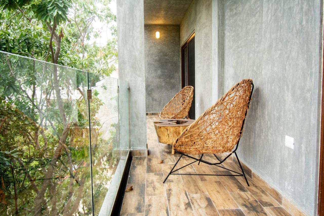 Hotel Casa Tortuga Tulum - Cenotes Park Inclusive Εξωτερικό φωτογραφία A view of the balcony of the hotel